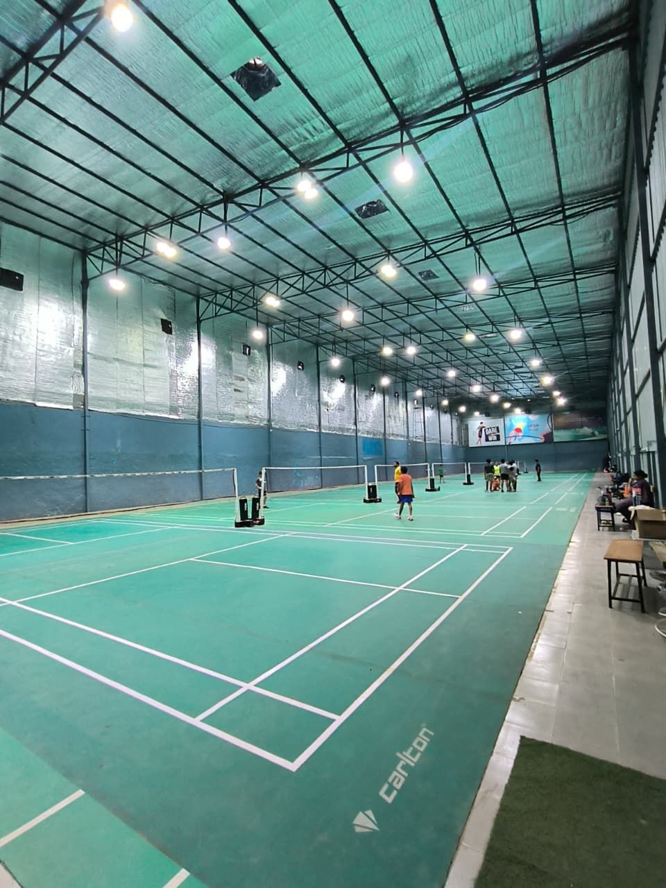 Rackonnect Strings & Feathers Badminton Arena | Sporbit